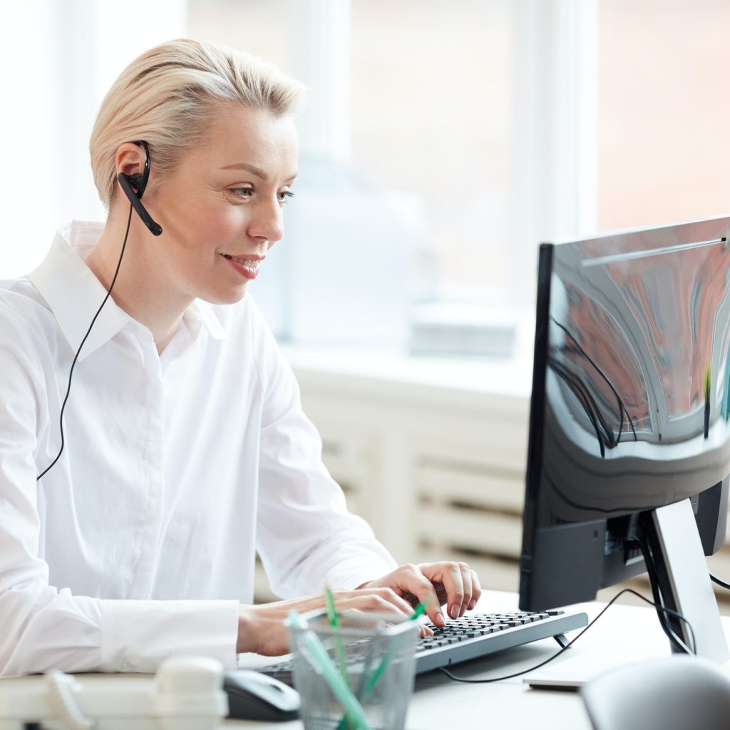 Female Operator in Call Center Office